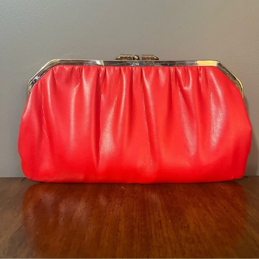 Red and Navy blue reversible vintage clutch purse with gold tone clasp.
